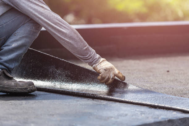 Professional Waterproofing technician working in Colden, NY
